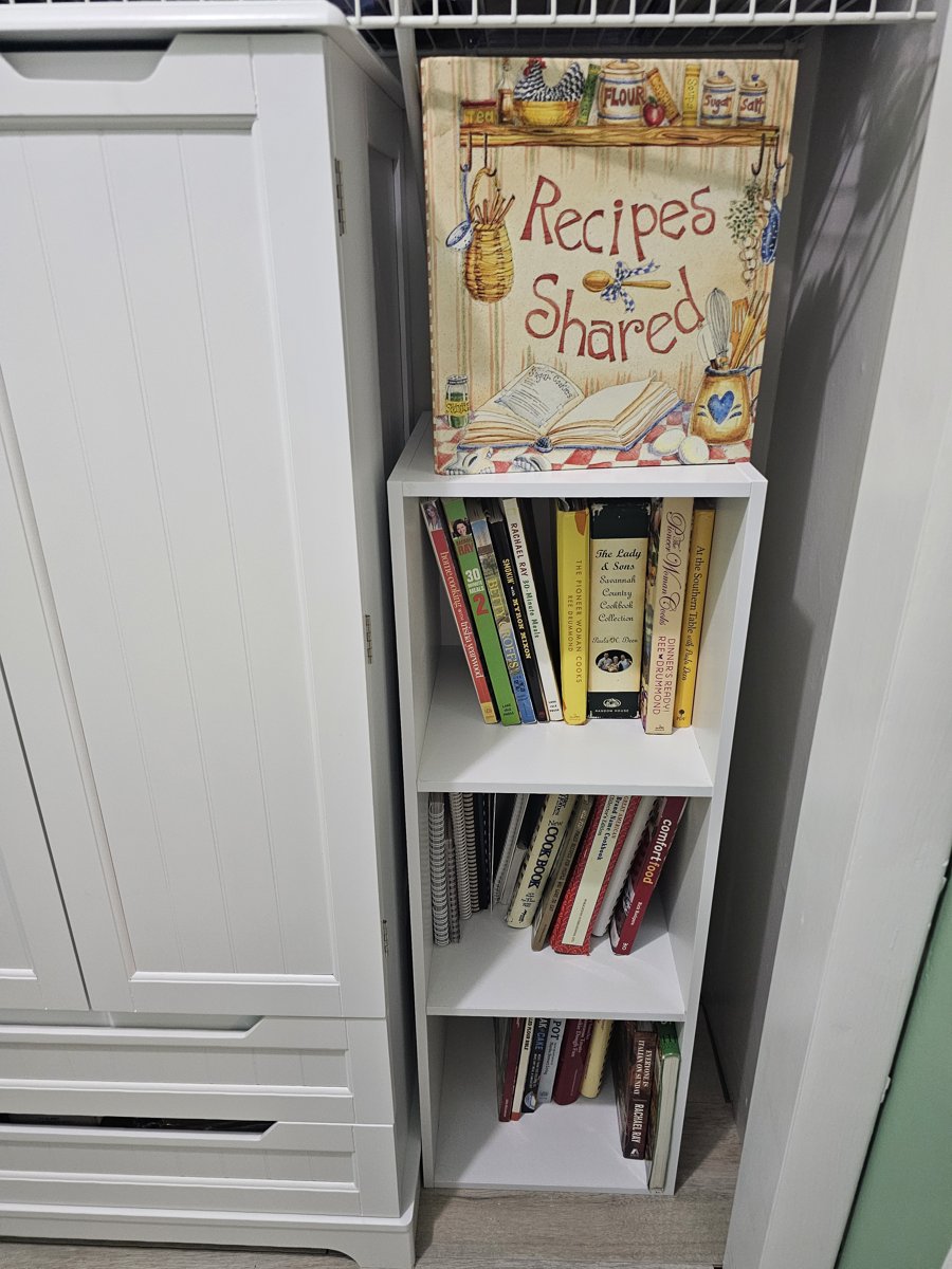 Furinno Luder white cube bookcase holding cookbooks