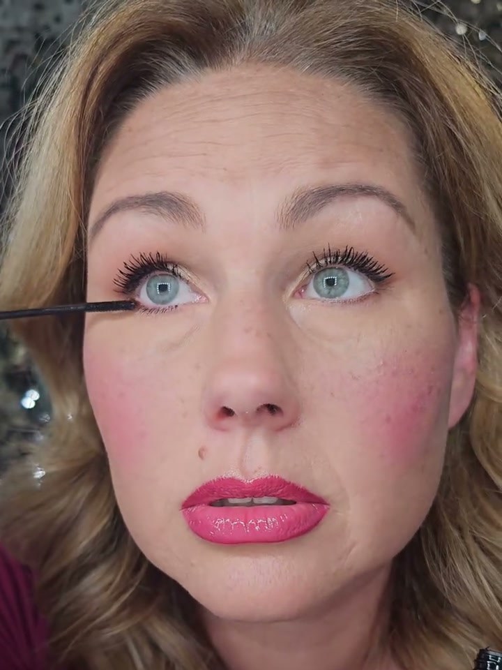 Bridget applying mascara